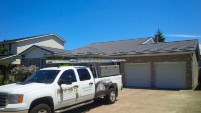 Hy-Grade-Steel-Roofing-Metal-Bungalow-Grey-Siding-Charcoal-Grey-Roof